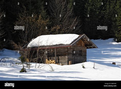 barn still covered in winter snow near grubsee near krun and mittenwald bavaria germany