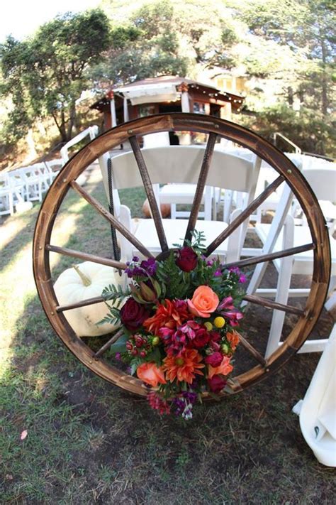 30 Rustic Country Wedding Ideas With Wagon Wheel Details