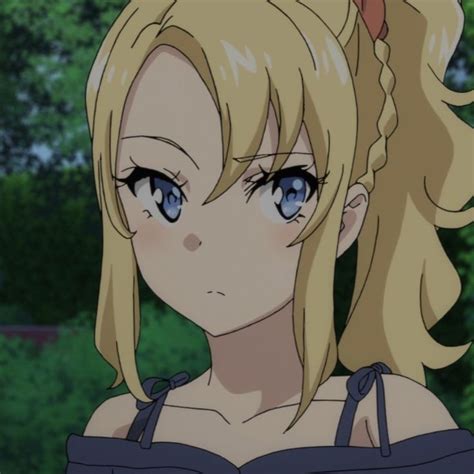 An Anime Girl With Blonde Hair And Blue Eyes Looks At The Camera While