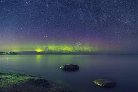 Aurora Borealis Northern Lights Over A Lake Ladoga Lake Stock Photo