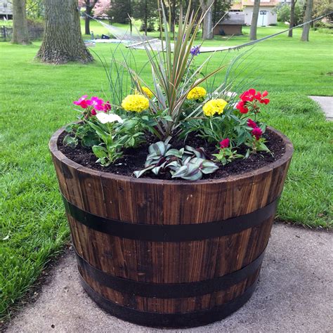 10 Landscaping Whiskey Barrel Planter Ideas For A Beautiful Garden