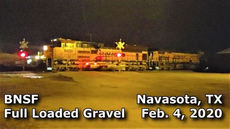 Bnsf 8451 Leads This Fully Loaded Gravel Train At Night Through