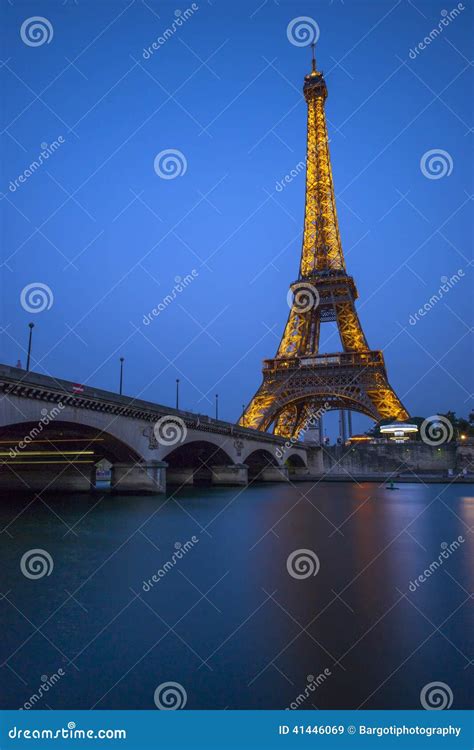 Long Exposure Of Eiffel Tower And Seine River At Dusk Editorial Stock