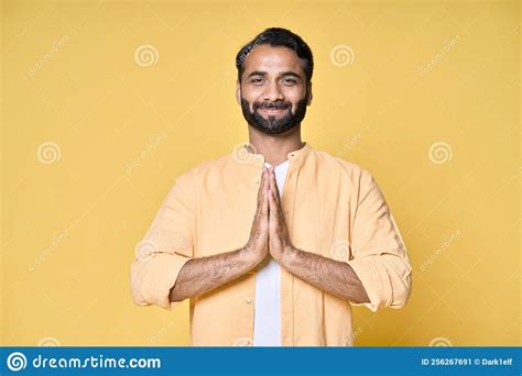 Mindful Happy Indian Man Meditating Holding Hands In Namaste Isolated