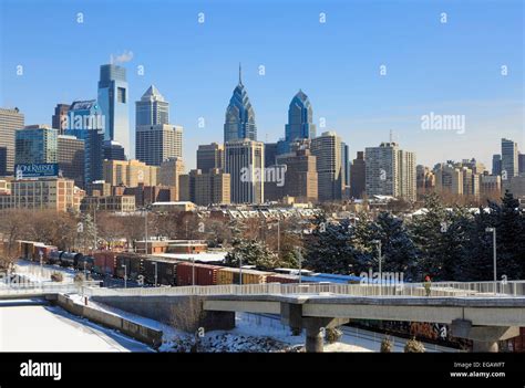 Train With Philadelphia Skyline In Winter Usa Stock Photo Alamy