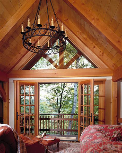 Explore our fully customizable timber frame home plans below. Hawk Mountain Timber Frame House Plan by Timberpeg