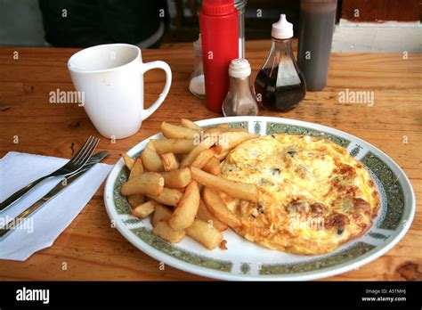Omelette And Chips In Cheap Cafe Stock Photo Alamy