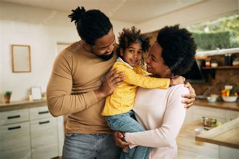 Free Photo Happy African American Parents With Daughter At Home