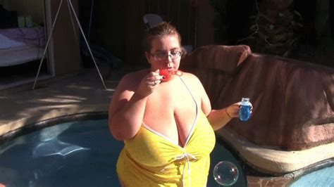 Minnie Mayhem Is In The Hot Tub Blowing Bubbles And Wearing Eye Glasses