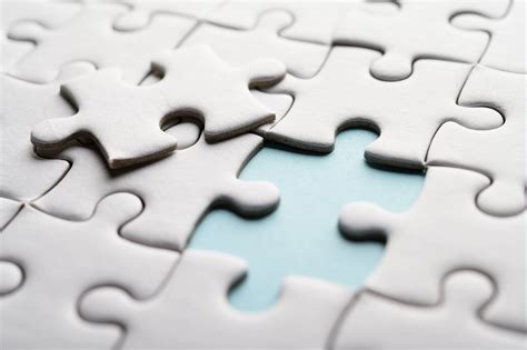 Jigsaw puzzle with missing piece. Missing puzzle pieces - ContactCenter4ALL