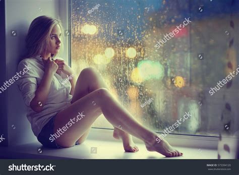 Sad Girl Sitting Window Lights City Stock Photo 573394120