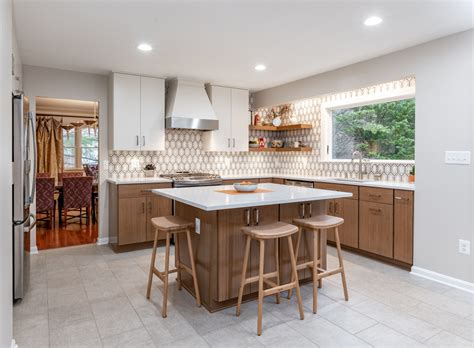 The spacious living room leads out to a private patio. Contemporary Kitchen with Contrasting Bamboo and White ...