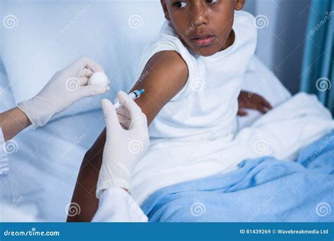 Doctor Giving An Injection To Patient In Ward Stock Image Image Of