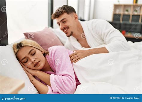 Man Waking Up His Girlfriend Lying On The Bed At Home Stock Image Image Of Hugging Beautiful