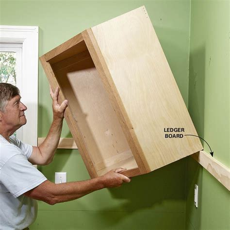 How to install a medicine cabinet. How to Install Cabinets Like a Pro | Installing kitchen ...