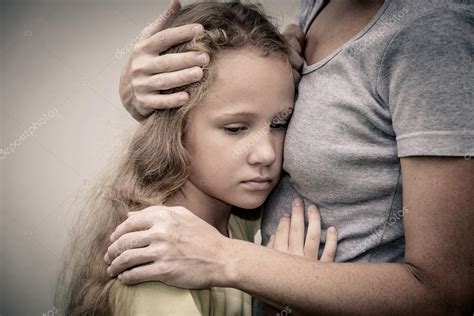 Portrait Of One Sad Daughter Hugging His Mother — Stock Photo