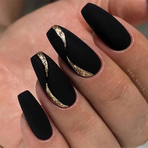 I can't decide what's cooler: Black and gold wave nail design | Black nail designs, Acrylic nail designs, Black coffin nails