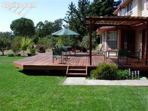 Some people also use compost, which is great for enriching the soil. Low Elevation Deck Picture Gallery | Decks backyard, Patio ...