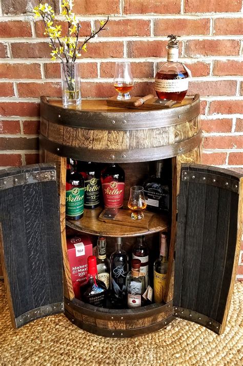 half whiskey bourbon barrel cabinet ~ handcrafted from a reclaimed whiskey barrel with doors