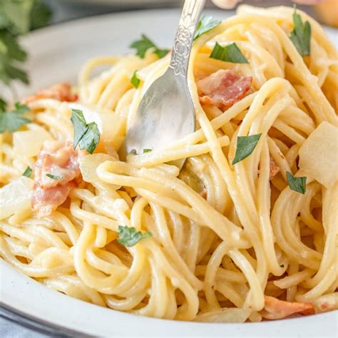 karboˈnaːra) is an italian pasta dish from rome made with egg, hard cheese, cured pork, and black pepper. Authentic Pasta Carbonara Recipe | YellowBlissRoad.com