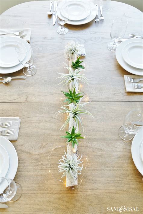 Birch Log Centerpiece With Air Plants And Succulents