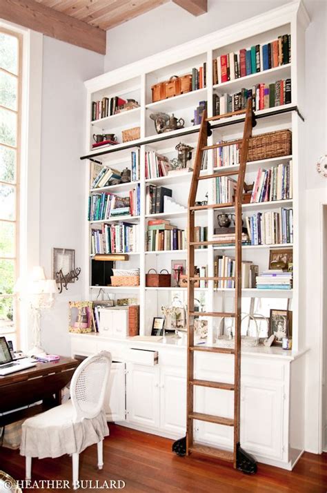 The Built In Bookshelves And Rolling Ladder In The Library Bookshelf