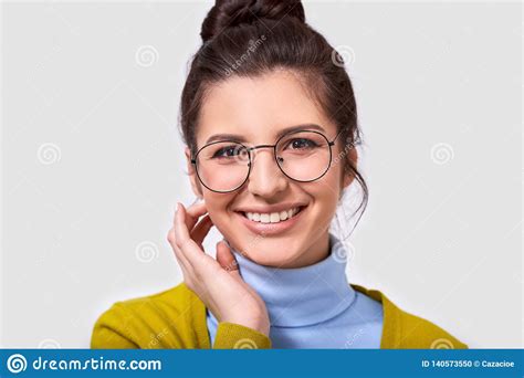 Isolated Closeup Image Of Pretty Young Woman Smiling And Wearing