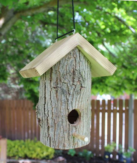 Shop bird houses to create joy at home. Window and Log Bird Houses and Feeders - Forest Street Designs