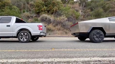 Ford Responds After Tesla Cybertruck Pulls F 150 In Tug Of War Video Cnet