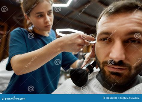 Close Up Shot Of A Professional Barber Girl Or Female Hairdresser