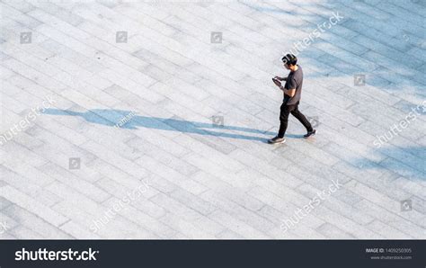 Top Aerial View People Walk On Across Pedestrian Concrete With Black