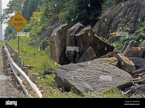 Rock Slides Sign Along Base Of Cliff Near Highway Ohio Usa Geology