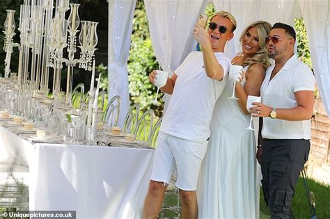 Frankie Essex Displays Her Toned Curves In A Plunging White Gown At Her
