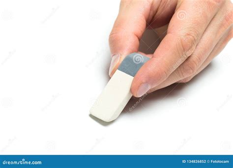 Men`s Hand Holding Eraser On Backgroung Close Up Stock Photo Image