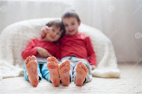 Little Kids Feet Covered With Prints From Kisses Stock Photo Image