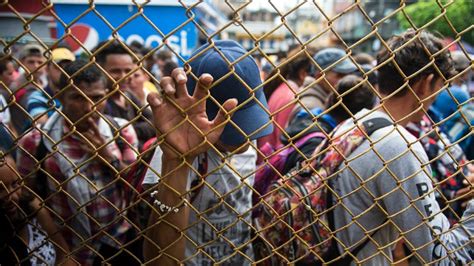 Caravan Migrants Defying Trump Warnings Smash Through Border Fence En Route To Mexican