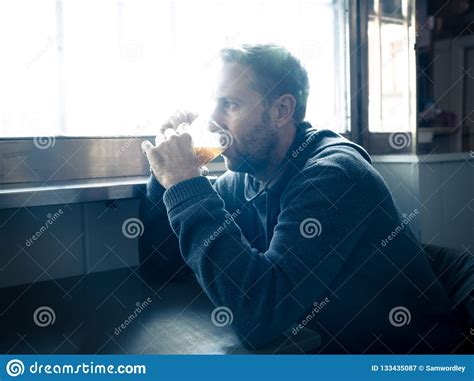 Alcoholic Depressed Man Drinking In A Bar Feeling Sad Hopeless A Stock