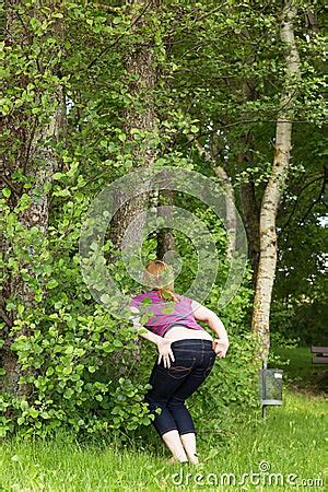 Woman Is Peeing In The Nature Stock Photo Image 49987893