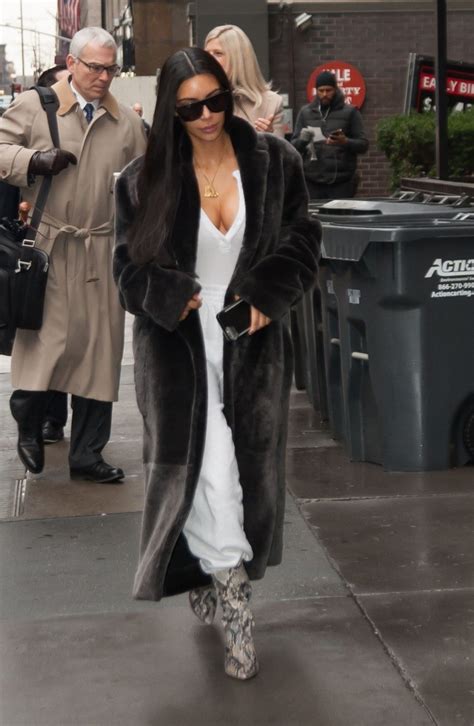 Kim Kardashian Rocks Luxurious Fur Coat And Edgy Snakeskin Booties In