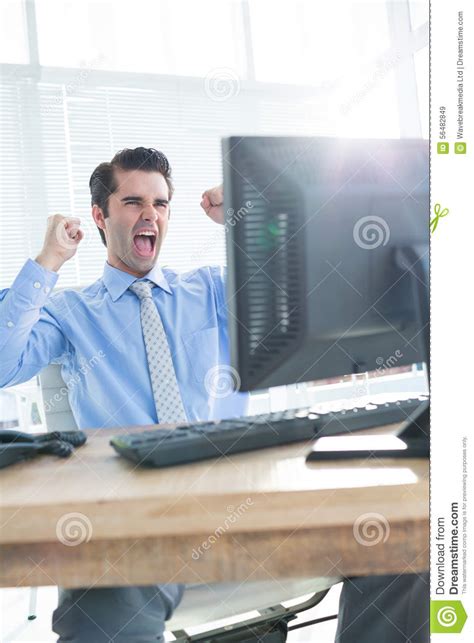 Cheerful Businessman Cheering In Office Stock Image Image Of Keyboard