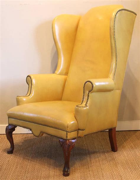 Shop our leather wing chairs selection from the world's finest dealers on 1stdibs. Mustard Yellow Leather Wing Chair at 1stdibs