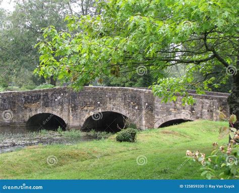 This Old Stone Bridge Has Held Many Feet And Wheels Stock Photo Image