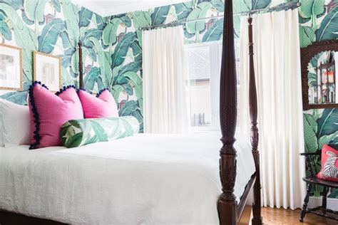 Master Bedroom With Floral Wallpaper And Four Poster Bed Hgtv