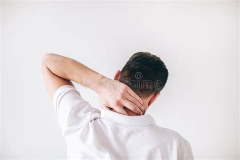 Young Man Isolated Over White Background Back View Of Guy Having