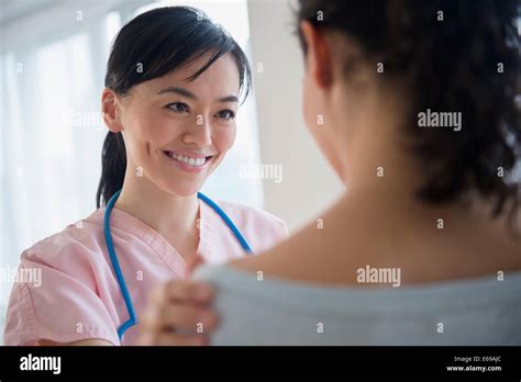 Nurse Talking To Patient In Hospital Stock Photo Alamy