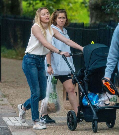 Amber ‘sedates Baby Oonagh Paige Heard Before Stroller Walks