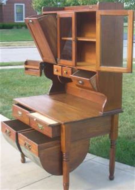 We specialize in price guides and reference books for the antiques and collectibles industry. EARLY Oak Hoosier Style WILSON Bakers Kitchen Cabinet ...