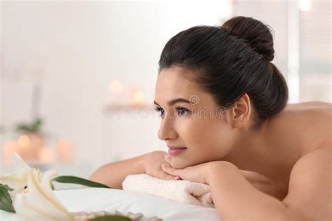 Young Woman Relaxing On Massage Table At Spa Salon Stock Image Image Of Caucasian Procedure