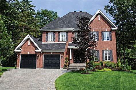 Not as simple as you'd think. Image result for black garage door red brick house | Brick ...