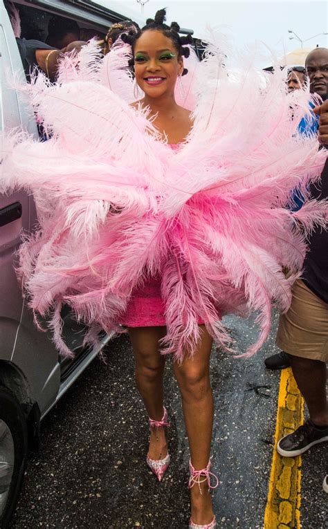 From A Pink Feathery Dress To Risqué Rhinestone Outfits See All Of